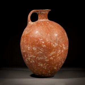 A Canaanite Large Red Slip Burnished Wine Jug