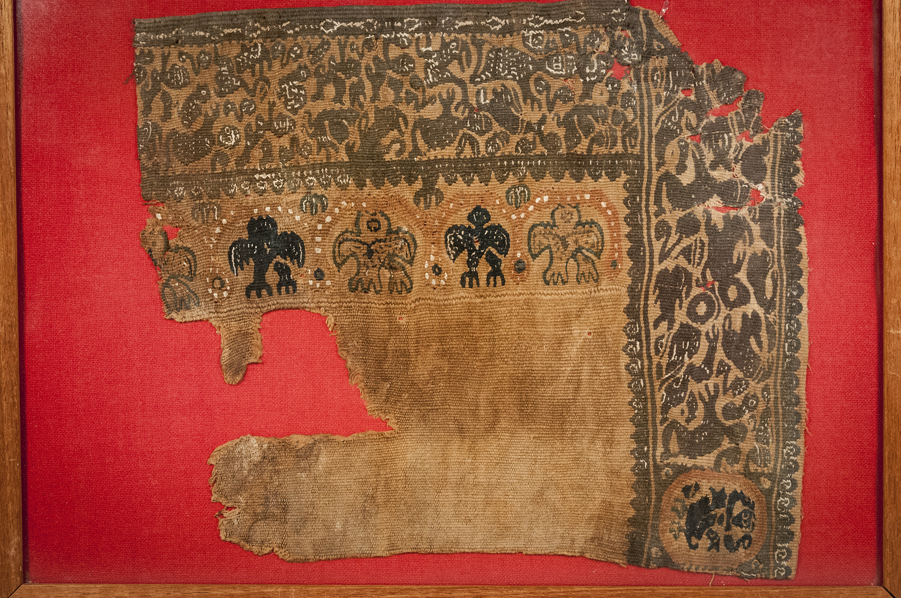 A Frieze Corner with Various Figures and Floral Patterns